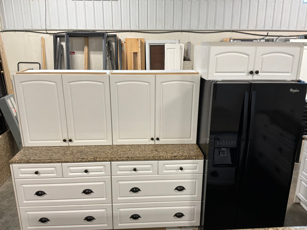 White Kitchen with Granite Countertops