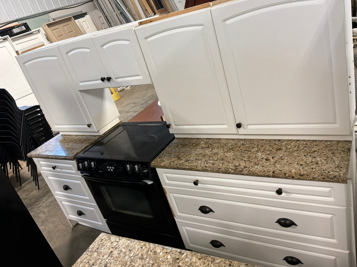 White Kitchen with Granite Countertops