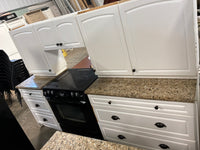 White Kitchen with Granite Countertops