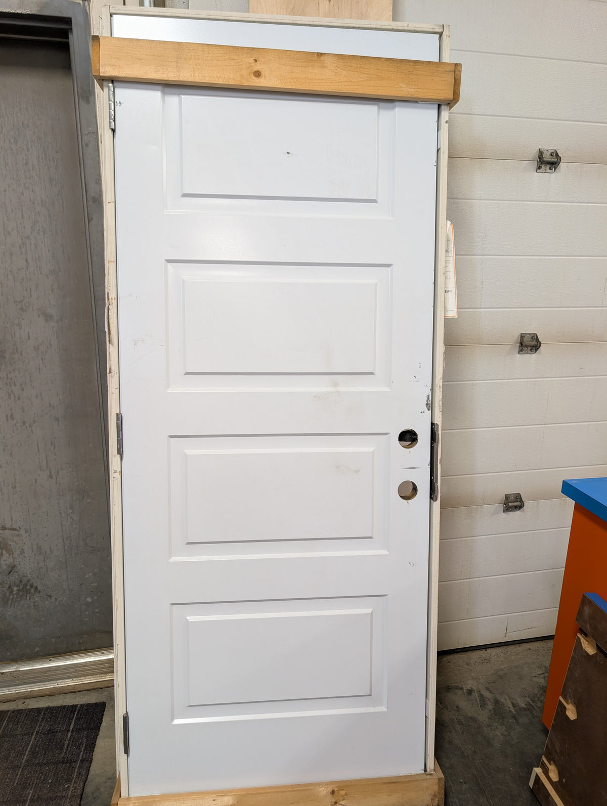 Metal Clad Exterior 4 panel door in frame