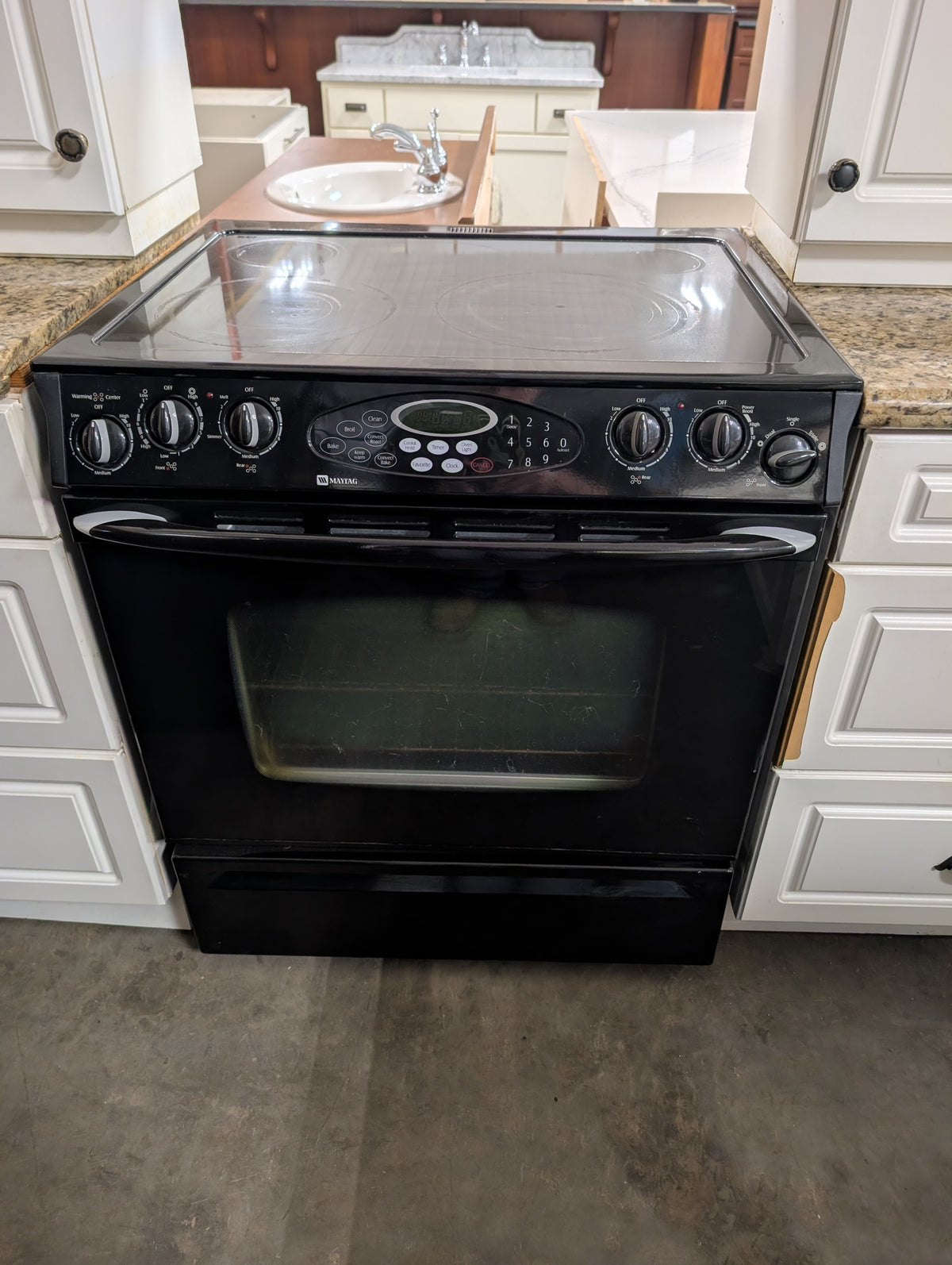 White Kitchen with Granite Countertops