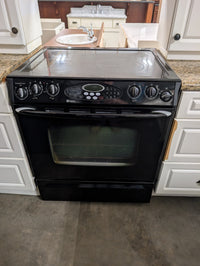 White Kitchen with Granite Countertops