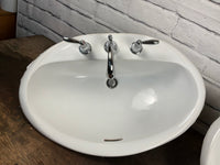 Porcelain Bathroom Sink with Moen Taps