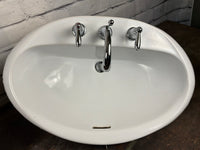 Porcelain Bathroom Sink with Moen Taps