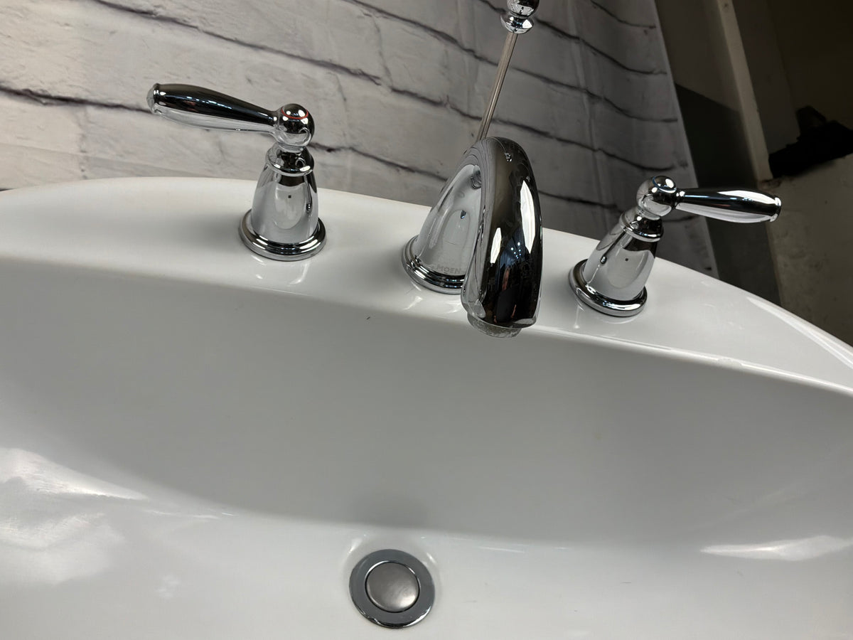 Porcelain Bathroom Sink with Moen Taps