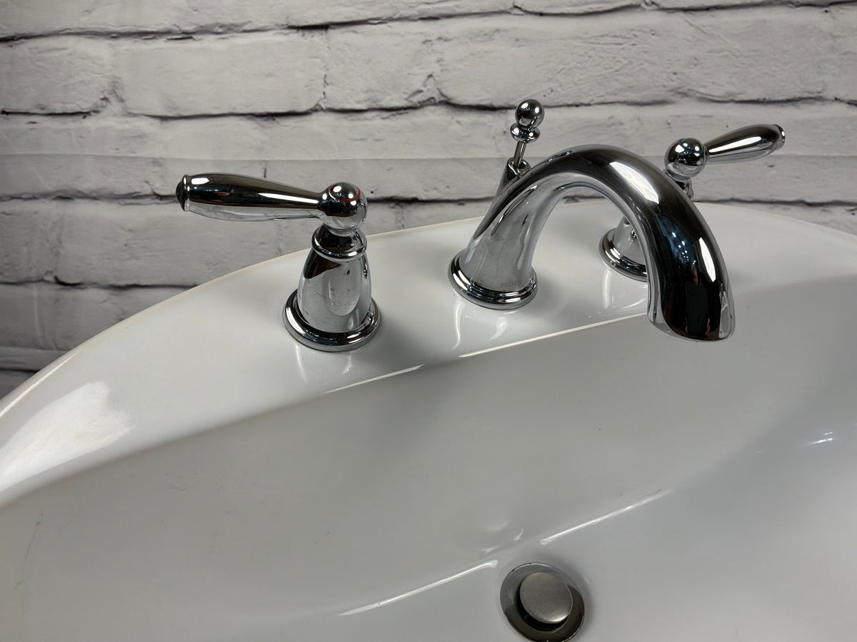 Porcelain Bathroom Sink with Moen Taps