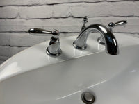 Porcelain Bathroom Sink with Moen Taps