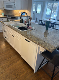 White Kitchen with Granite Countertops