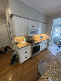 White Kitchen with Granite Countertops