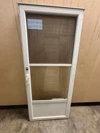 Screen door in frame