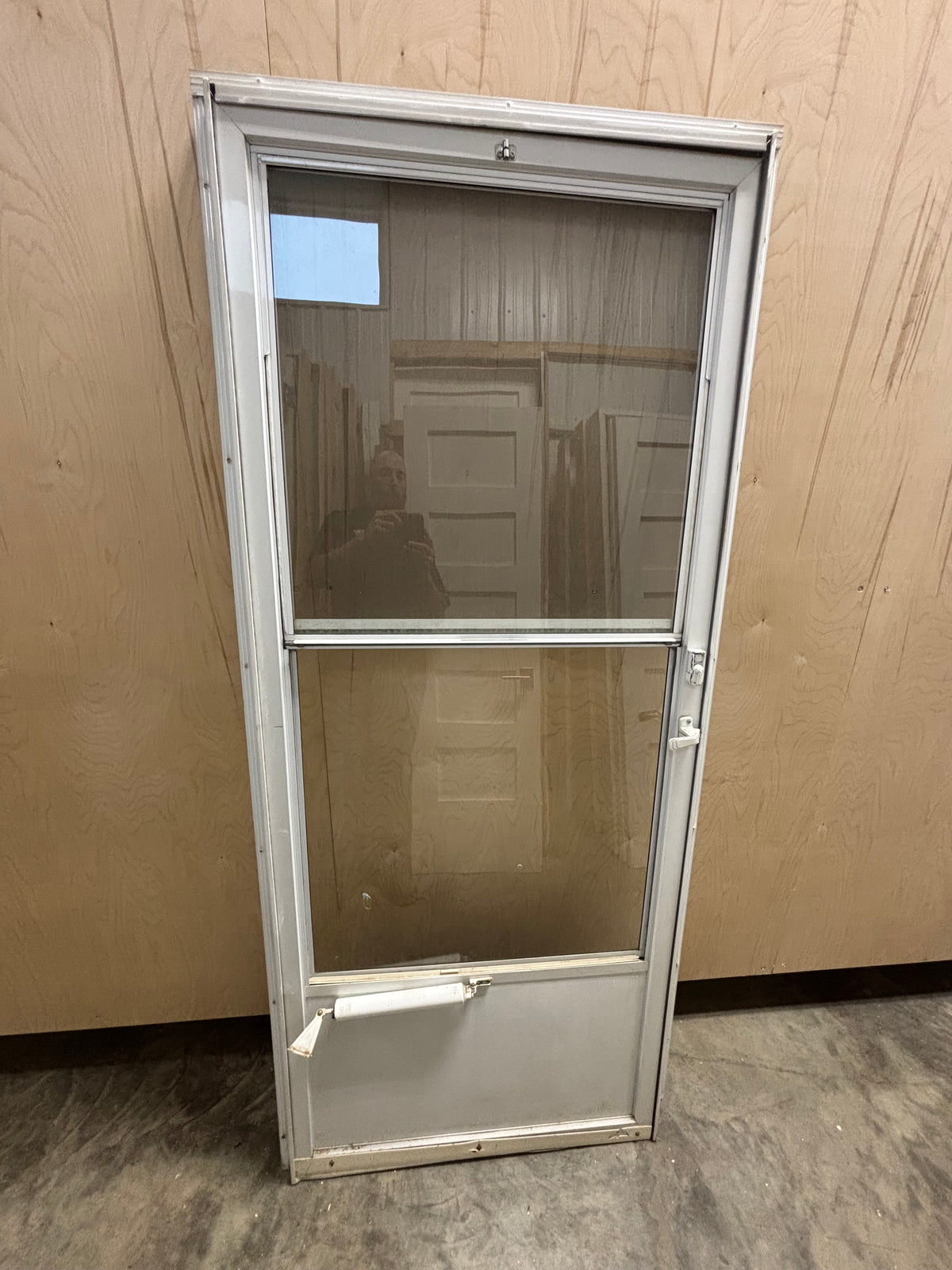 Screen door in frame