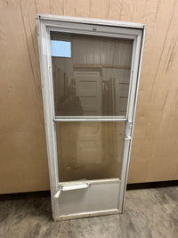 Screen door in frame