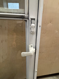 Screen door in frame