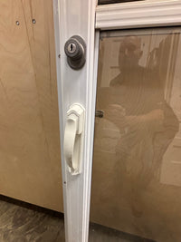 Screen door in frame